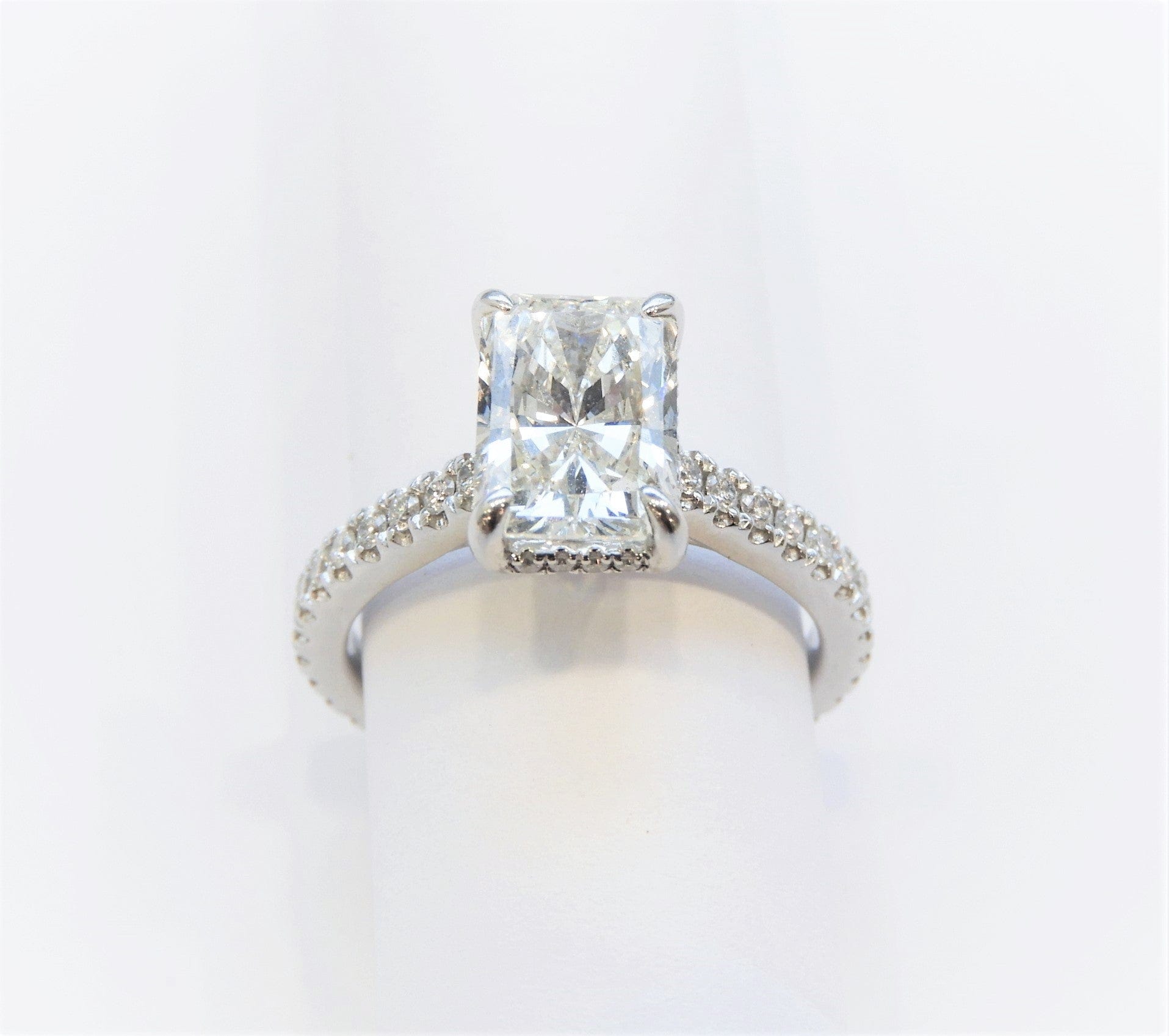 Touch of Gold Platinum Radiant Cut Hidden Halo Diamond Engageme